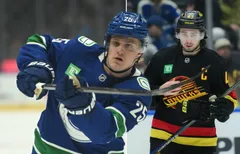 Elias Pettersson och Quinn Hughes.