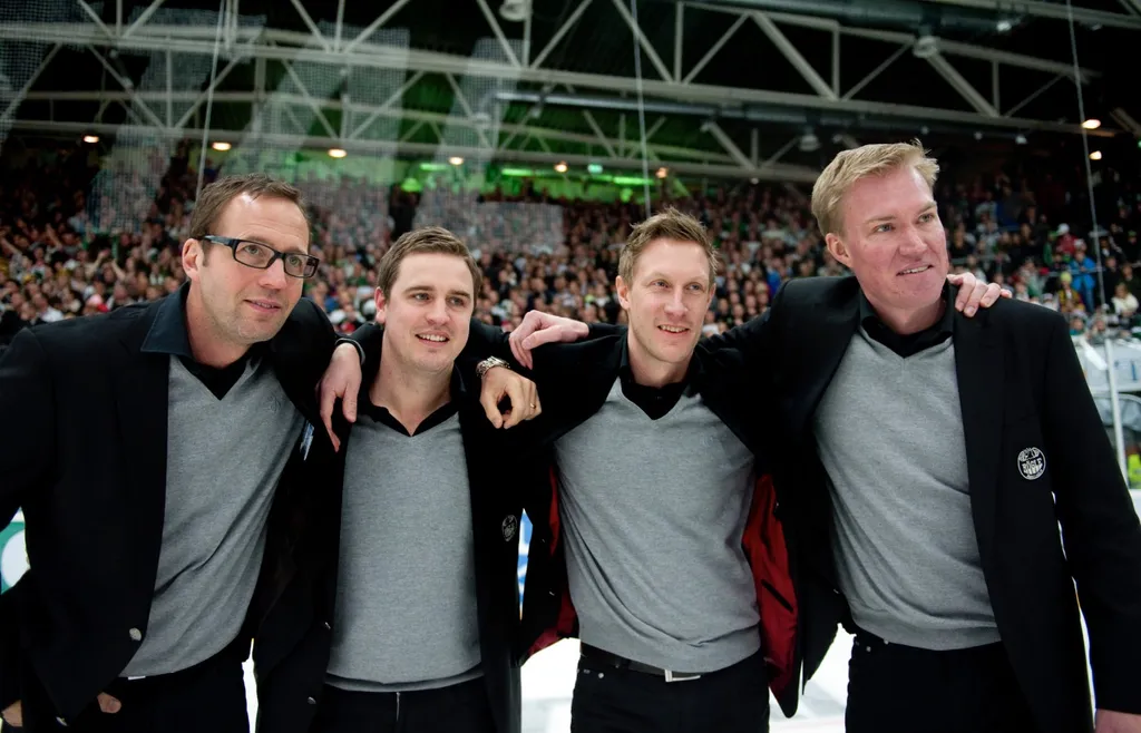 Rögles tränare, Roger Hansson, Dan Tangnes, Magnus Wennström och Kenny Jönsson, firar avancemanget till SHL 2012